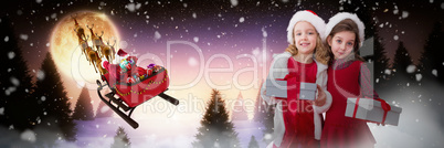 Composite image of cute girls with gifts