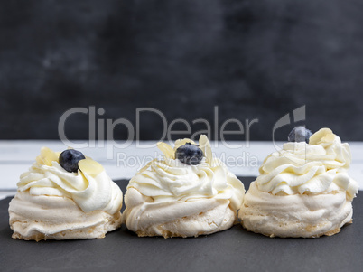 baked round meringues with whipped cream