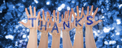 Hands Building Word Thanks, Glittering And Sparkling Bokeh Background