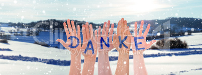 Many Hands Building Danke Means Thank You, Winter Scenery As Background
