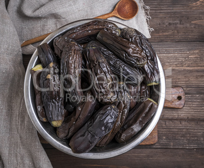 boiled eggplants in an iron bowl