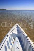 Kayak glides through water along the coastline of Marco Island,