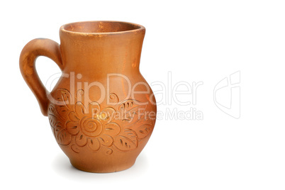 Beautiful clay jug isolated on white background. Free space for