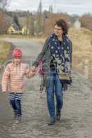 Woman with child on walk