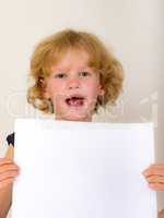 Child holds blank piece of paper