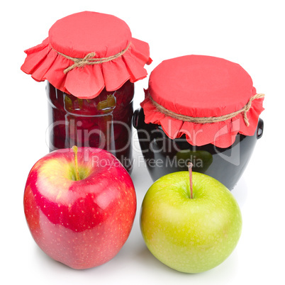 Apple jam in a glass jar, fresh red and green apples isolated on