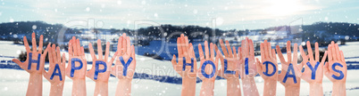 Many Hands Building Word Happy Holidays, Winter Scenery As Background