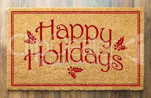 Happy Holidays Christmas Tad Welcome Mat On Wood Floor Backgroun