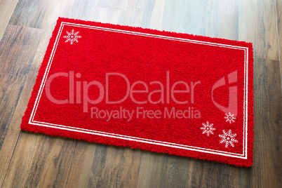Blank Holiday Red Welcome Mat With Snow Flakes On Wood Floor Bac