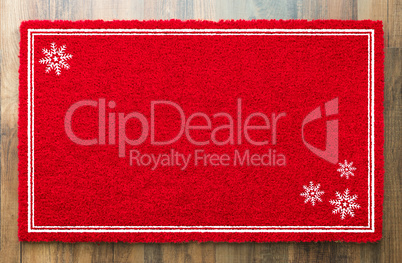 Blank Holiday Red Welcome Mat With Snow Flakes On Wood Floor Bac