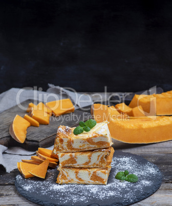 pieces of cottage cheese pie and fresh pumpkin