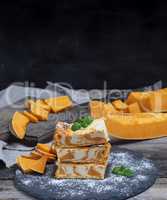 pieces of cottage cheese pie and fresh pumpkin