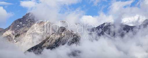 Panoramic Aerial Banner of Clouds Over The Rocky Mountains