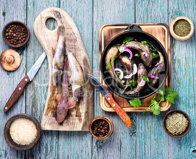 Frying pan with tasty fish