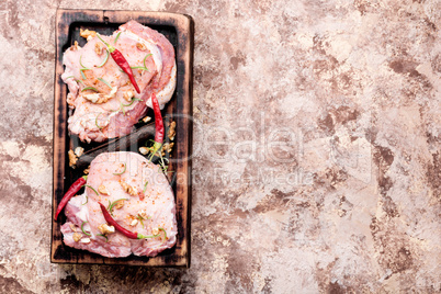 Two pieces of raw pork
