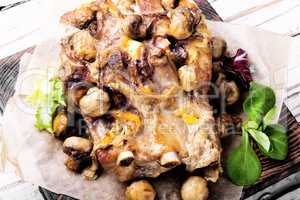 Baked meat with forest mushrooms