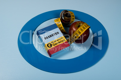 Blue circle with some Diabetes equipment do treatment the disease.