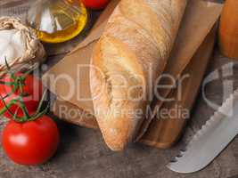 Organic baguette bread on a wooden table