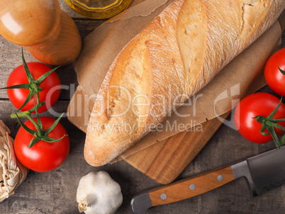 Organic baguette bread on a wooden table