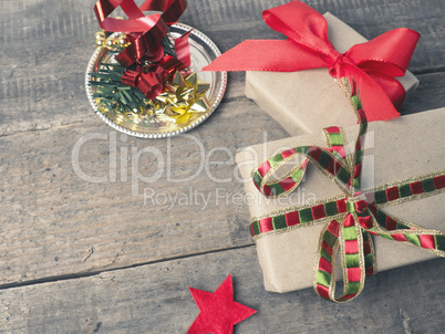 Christmas gifts on a wooden floor