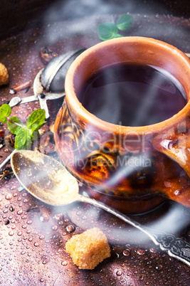 Tea cup and tea leaf