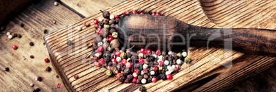 peppercorn in rustic mortar