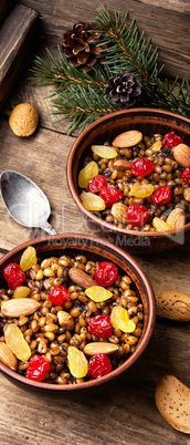 Wheat porridge with nuts and raisins