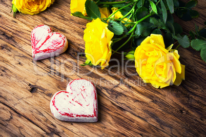 Spring flowers and symbolic red hearts