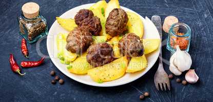 Meat balls with baked potatoes