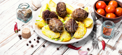 Meat balls with baked potatoes