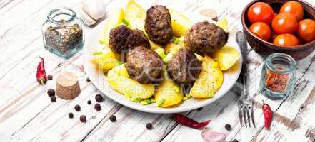 Meat balls with baked potatoes