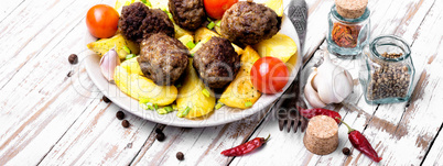 Meat balls with baked potatoes