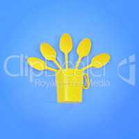 A yellow plastic mug and spoons lay in it on a bright blue background. The concept of a holiday, a picnic.