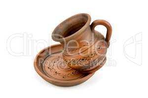 Ceramic cup and saucer isolated on white background.