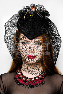Portrait of female in hat on Halloween