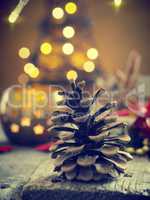 Christmas background with pine cone and decoration