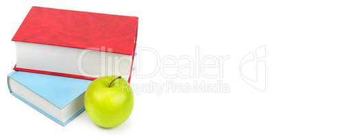 Books and apple isolated on white background. Wide photo. Free s