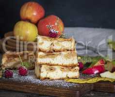 square pieces of apple pie are stacked