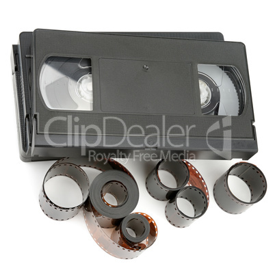 A set of video tapes and photographic film isolated on white bac