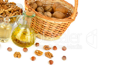 Oil of walnut and hazelnut, nutfruit isolated on white backgroun