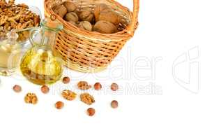 Oil of walnut and hazelnut, nutfruit isolated on white backgroun