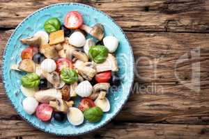 Greek salad on retro background