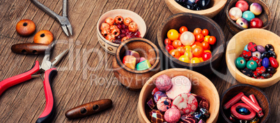 Fashion beads in wooden bowls