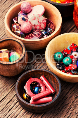 Fashion beads in wooden bowls