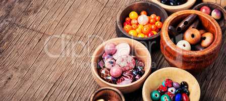 Fashion beads in wooden bowls