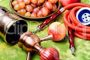 Stylish oriental shisha with grapes