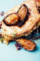 Grilled pork with fig on plate