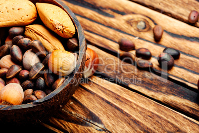 Wooden bowl with mixed nuts