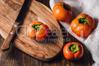 Persimmons with Knife