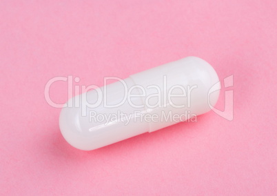 White Pill on Pink Background